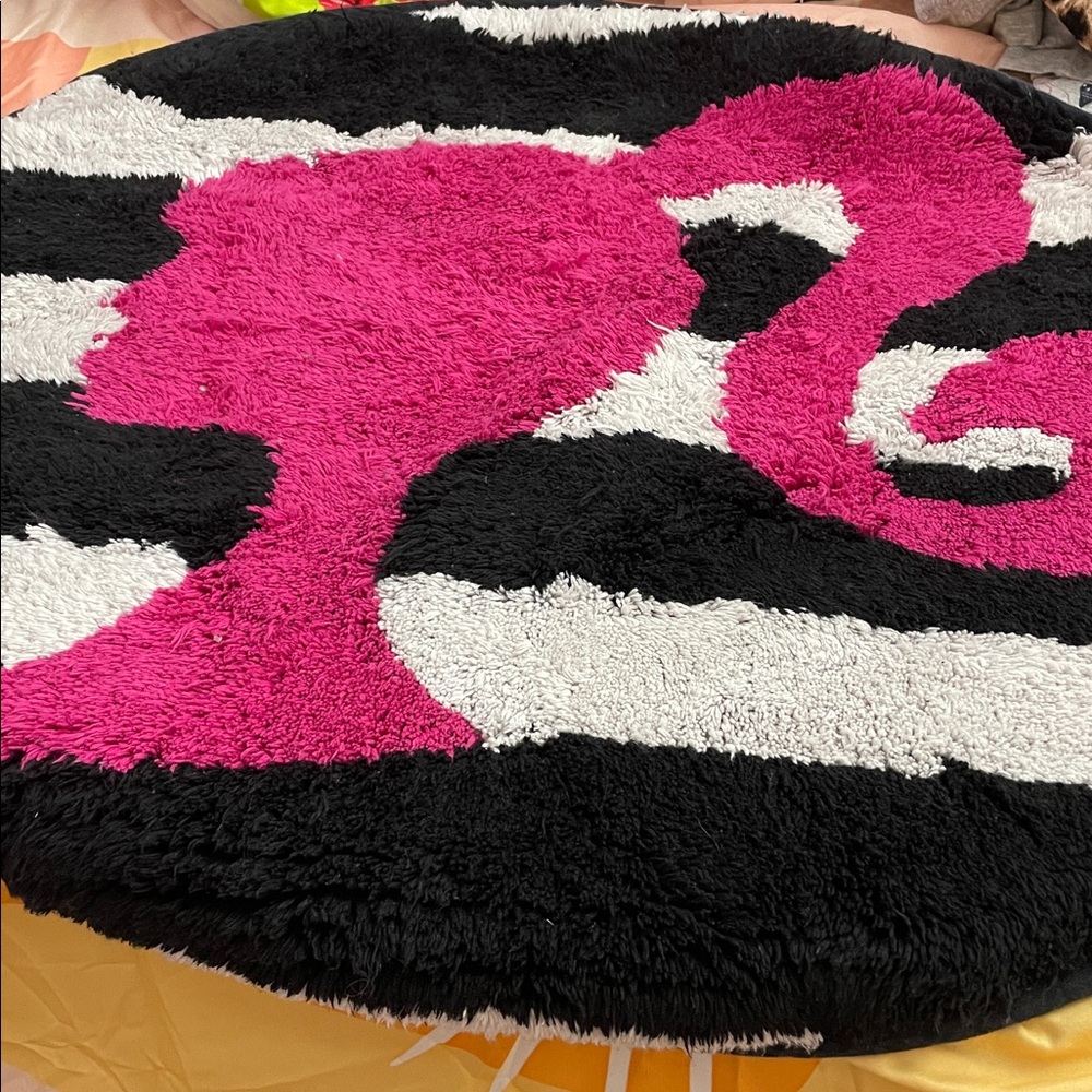 SOLD OUT!!!!!!

Barbie Round Pink and Black Rugs with Silhouette Design
